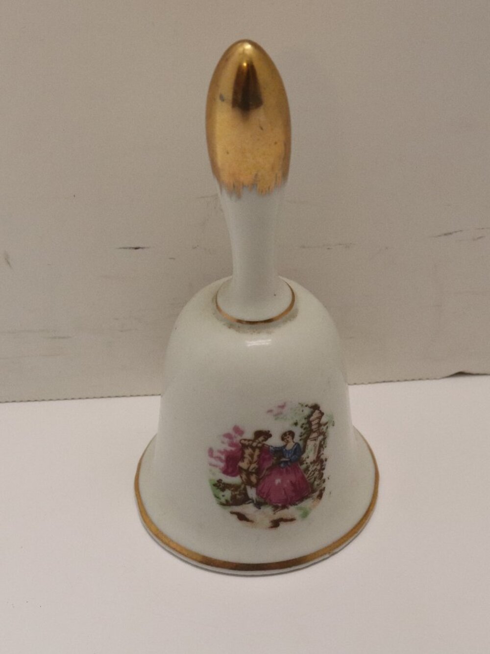 COLLECTIBLE WHITE PORCELAIN 5" BELL WITH DANCING COUPLE & GOLD ACCENT BRINN'S